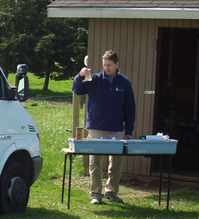 Founder, Glenn Karn, conducting on-site water quality testing.