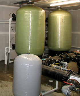 Water treatment and filtration system for 17-home community.